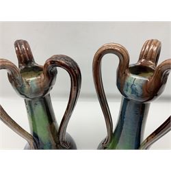 Pair of Art Nouveau style vases, probably Belgian, each with merging blue, brown and green decoration and three handles, impressed LSV beneath, H32cm