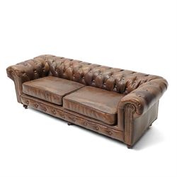 Miniature brown leather button back Chesterfield sofa, with castors 