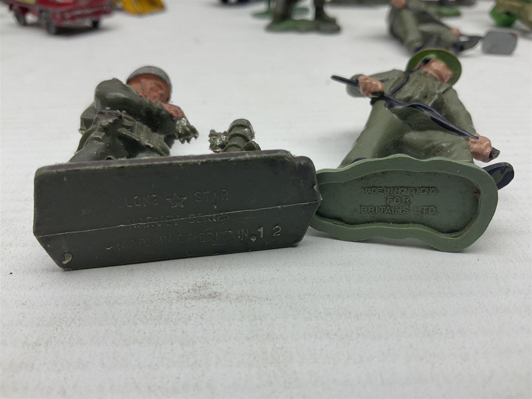 Various makers - unboxed and playworn die-cast models including Dinky Thornycroft Mighty Antar Tank Transporter No.660 and Centurion Tank No.651, other military and farm vehicles; and quantity of loose plastic soldiers and other figures by Crescent, Britains etc