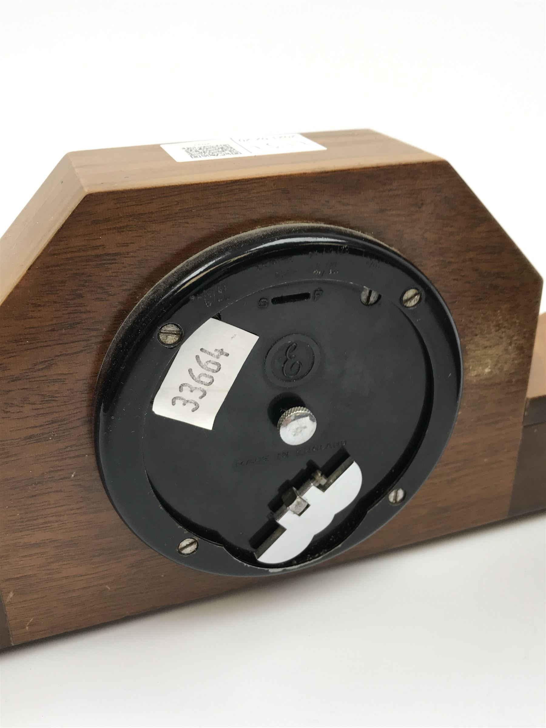 Mid to late 20th century walnut mantel clock by 'Elliot' (W29cm), and an Edwardian mahogany dome top mantel clock (H20cm)