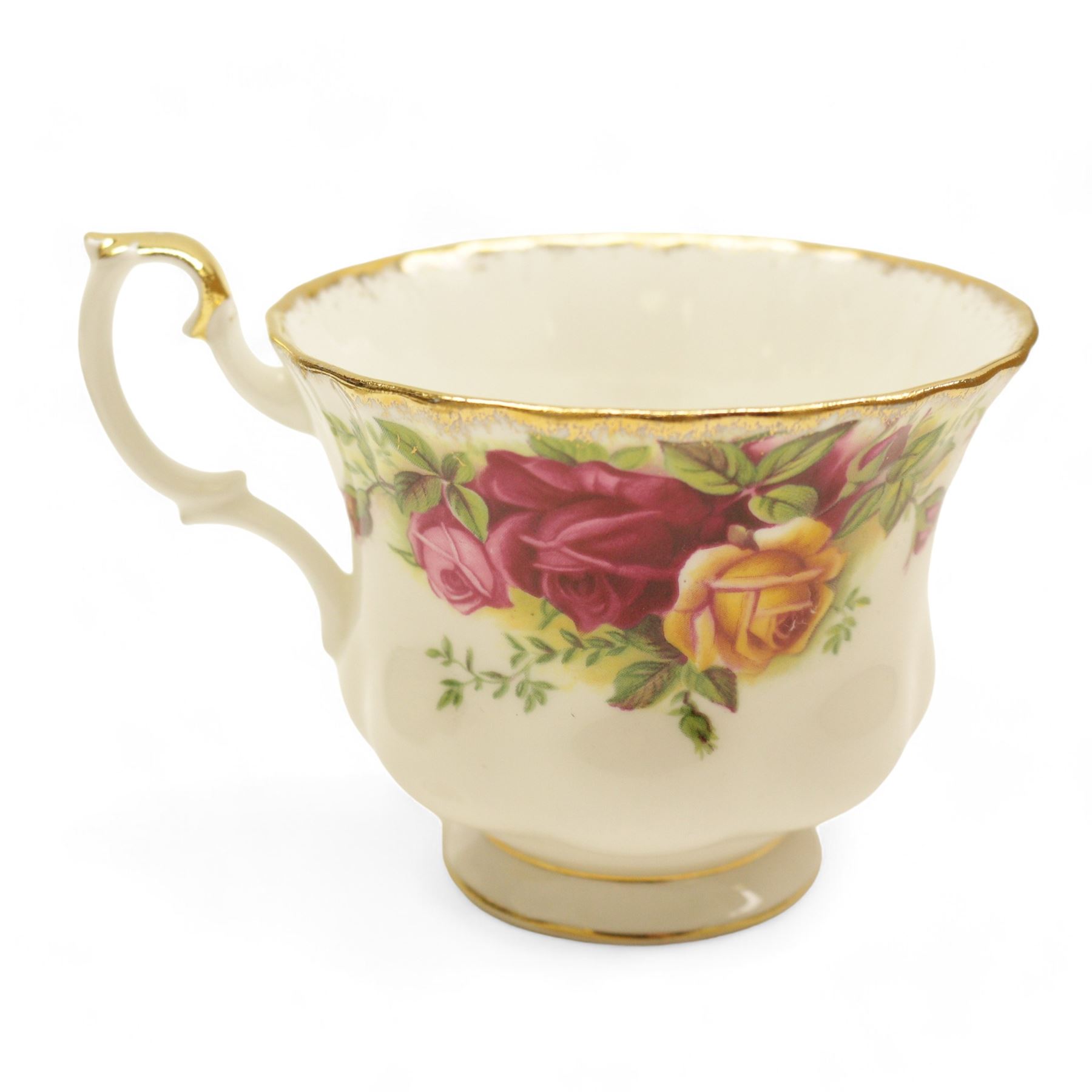 Royal Albert Country Roses tea and dinner service, teapot, milk jug, covered sucrier, eight dinner plates, eight teacups and saucers 