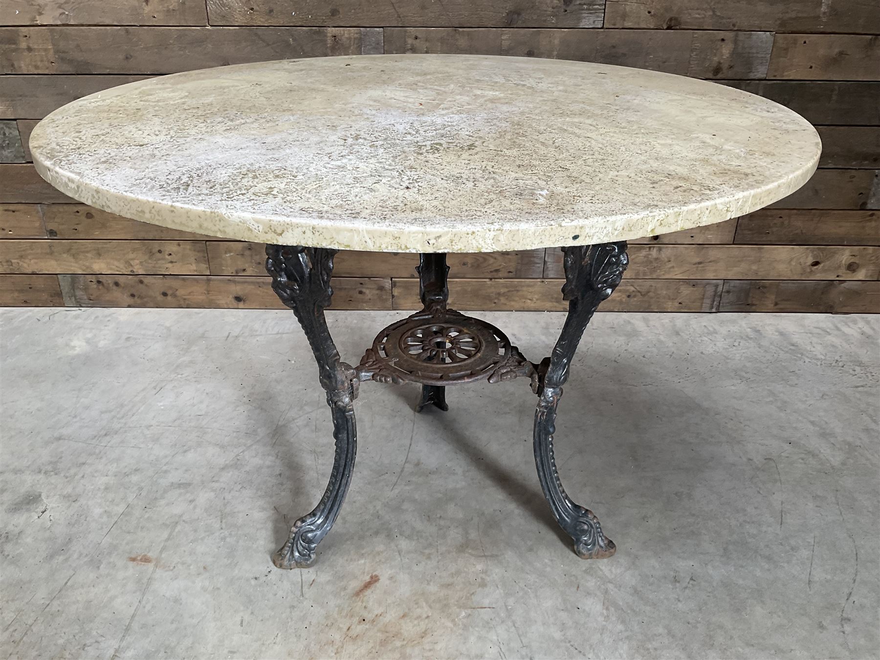 Cast iron pub garden table with circular composite marble top