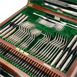 Extensive canteen of silver Kings Pattern cutlery for twelve covers comprising silver handled table and dessert knives, table and dessert forks, fish knives, forks and servers, dessert spoons, soup spoons and table spoons, sauce and soup ladles, salad servers, carving knives and forks etc 134 pieces in mahogany case with countersunk brass handles W49cm Sheffield 1928 Maker Walker & Hall 