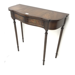 Reproduction Regency style mahogany side table, serpentine front, two drawers, turned tapering supports, W80cm, H73cm, D34cm