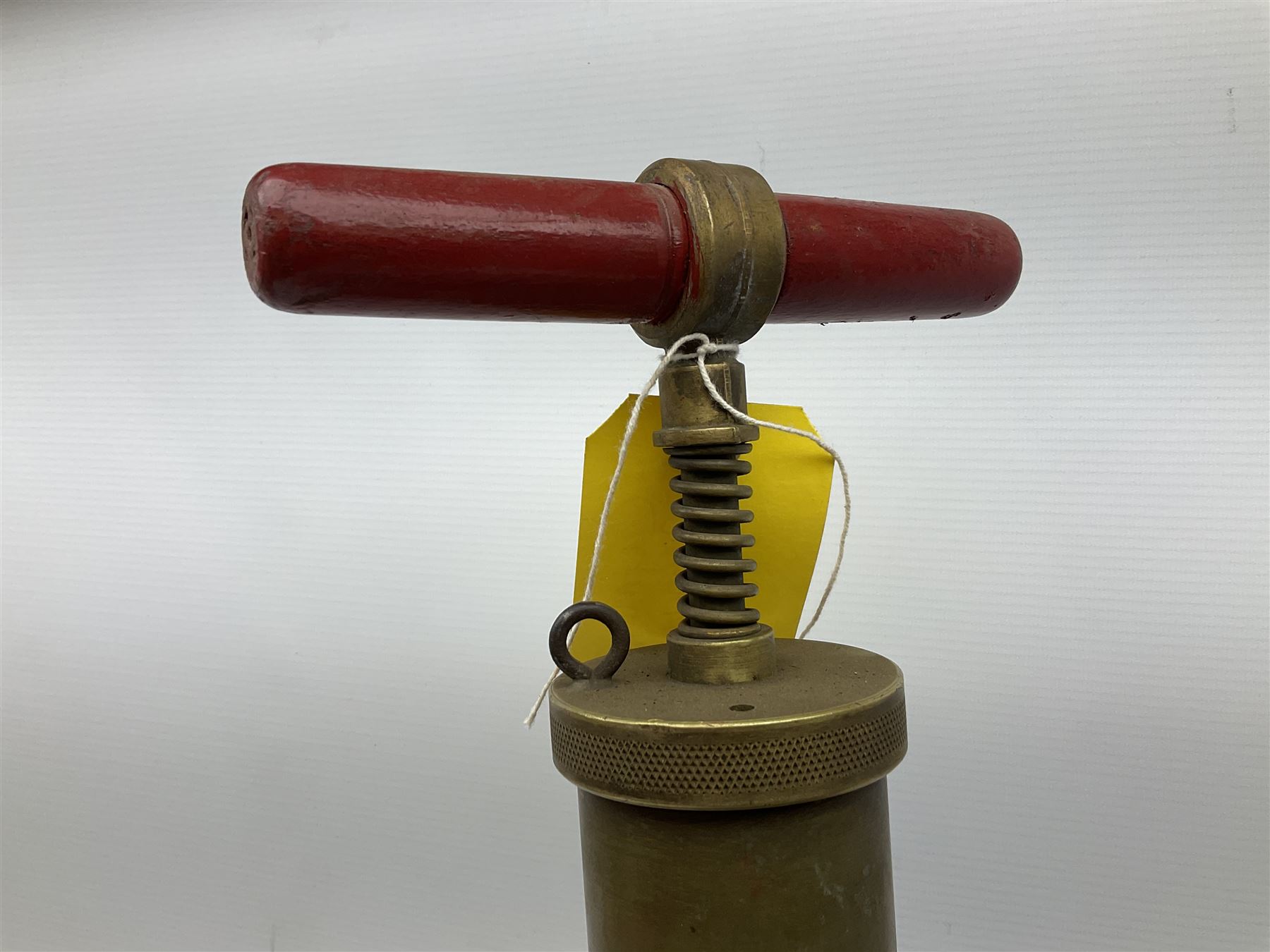 Blue and red painted gas powered bird / pest scarer, bearing label 'Exid bird & pest scarer, imported by C.R.E.A.C.O Hadleigh, Essex', , copper and brass Cymag gas hand pump, three eel spears and a set of badger tongs. Auctioneer's Note: These traps are sold as artefacts for ornamental purposes only as the use of some of them is illegal.