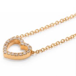 Tiffany & Co. 18ct gold 'Mini Metro' diamond heart pendant, stamped 750, boxed