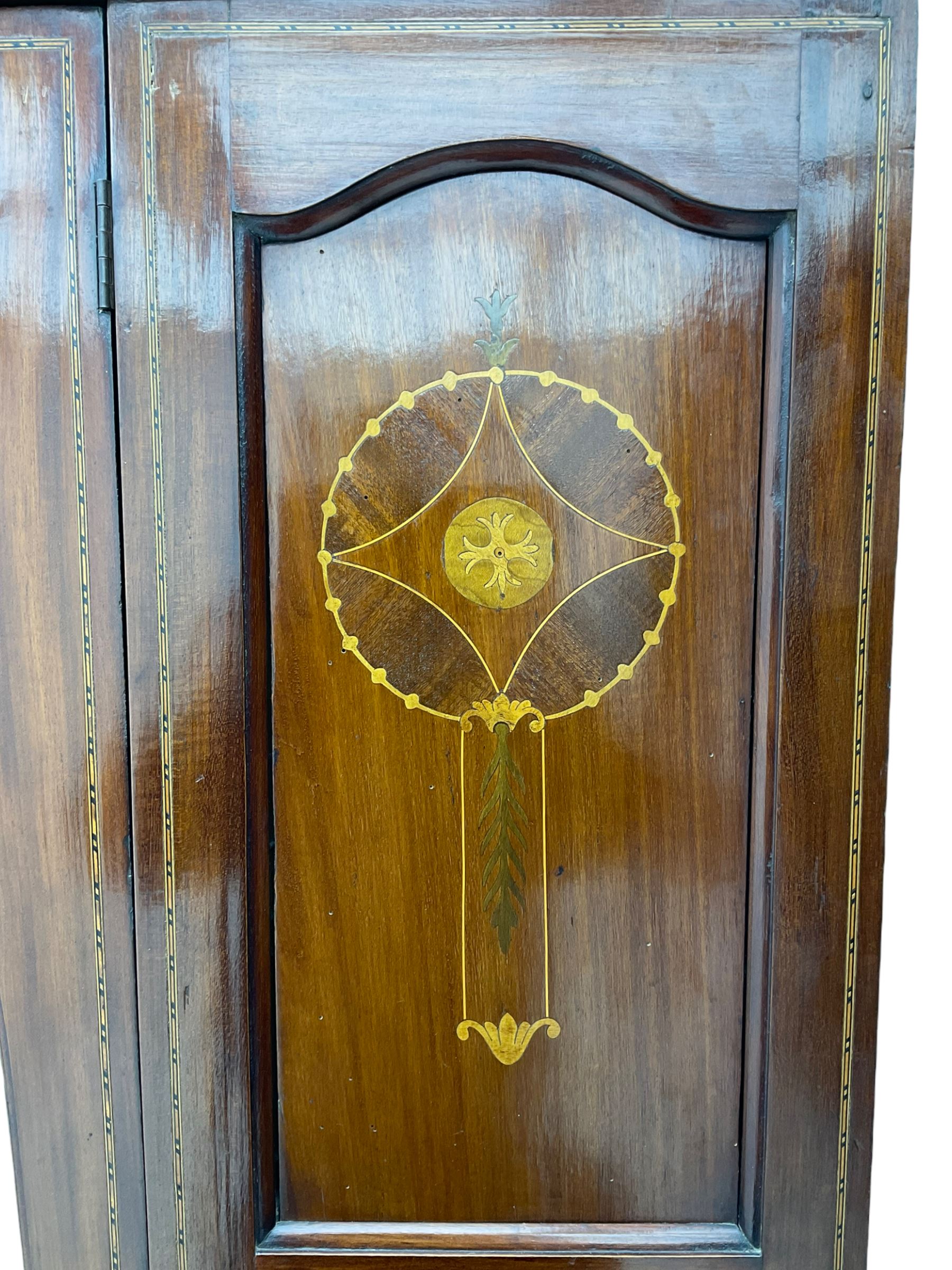 Edwardian inlaid mahogany wardrobe, oval mirror door, single drawer to base