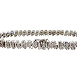 18ct white gold diamond bracelet, two rows of round brilliant cut diamond with an S link between each pair, stamped 750, total diamond weight approx  3.25 carat
