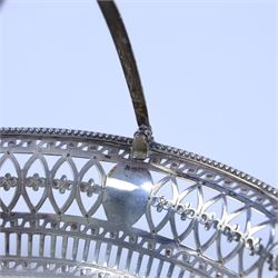 George III silver bon bon basket, of oval form with bead rim and swing handle, the sides with pierced latticework decoration, hallmarked Hester Bateman, London 1785, handle H14cm