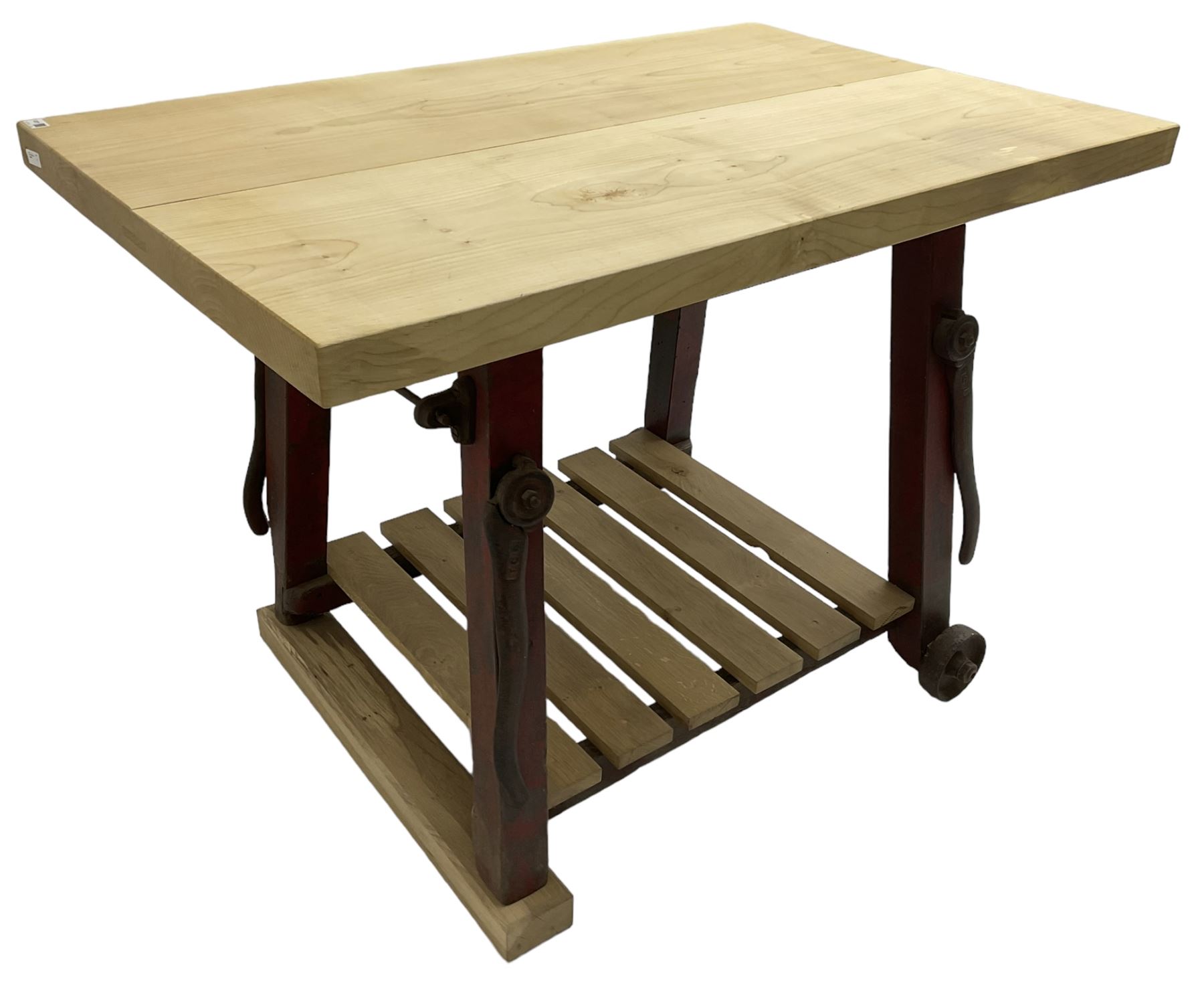 Kitchen island with rectangular maple top, on reclaimed machinery base with oak pot board, on block sledge feet