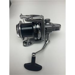 Four fixed spool reels, all in original boxes, comprising Shimano Ultegra 5500 XSD, with spare spool, Mitchell Autosurf 700, with spare spool, Shimano Sedona 600 FB with spare spool and D.A.M Quick 5001