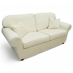 Large traditional shape two-seat sofa (W213xm, H101cm, D94cm); together with matching armchair (W116cm); and footstool (53cm x 78); upholstered in cream textured fabric