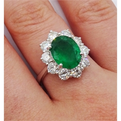  White gold oval emerald and round brilliant cut diamond ring, stamped 750, emerald approx 2.80 carat, diamond total weight approx 1.50 carat [image code: 1mc]  