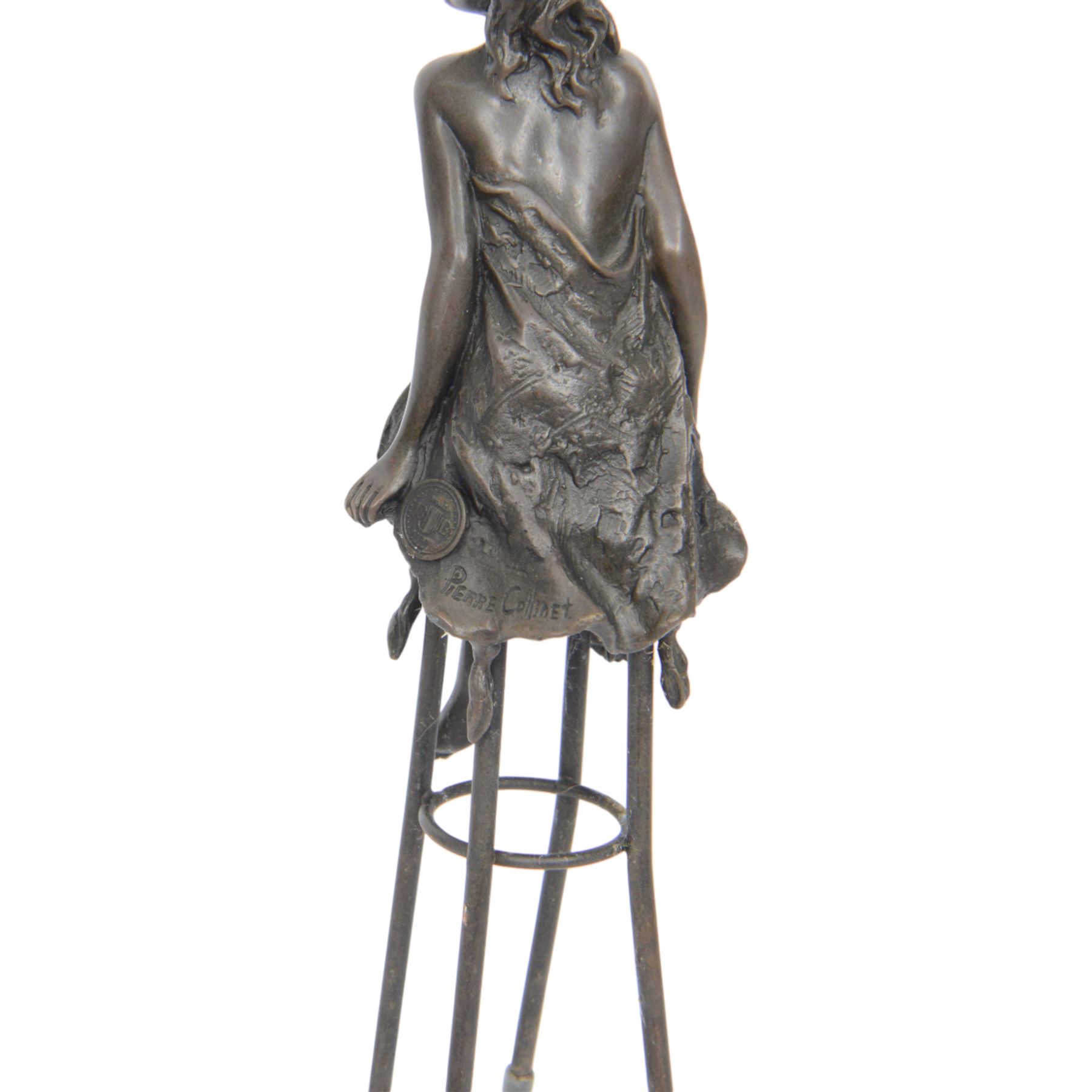 Art Deco style bronze modelled as a semi naked female figure, seated upon a chair, after 'Pierre Collinet', H27cm
