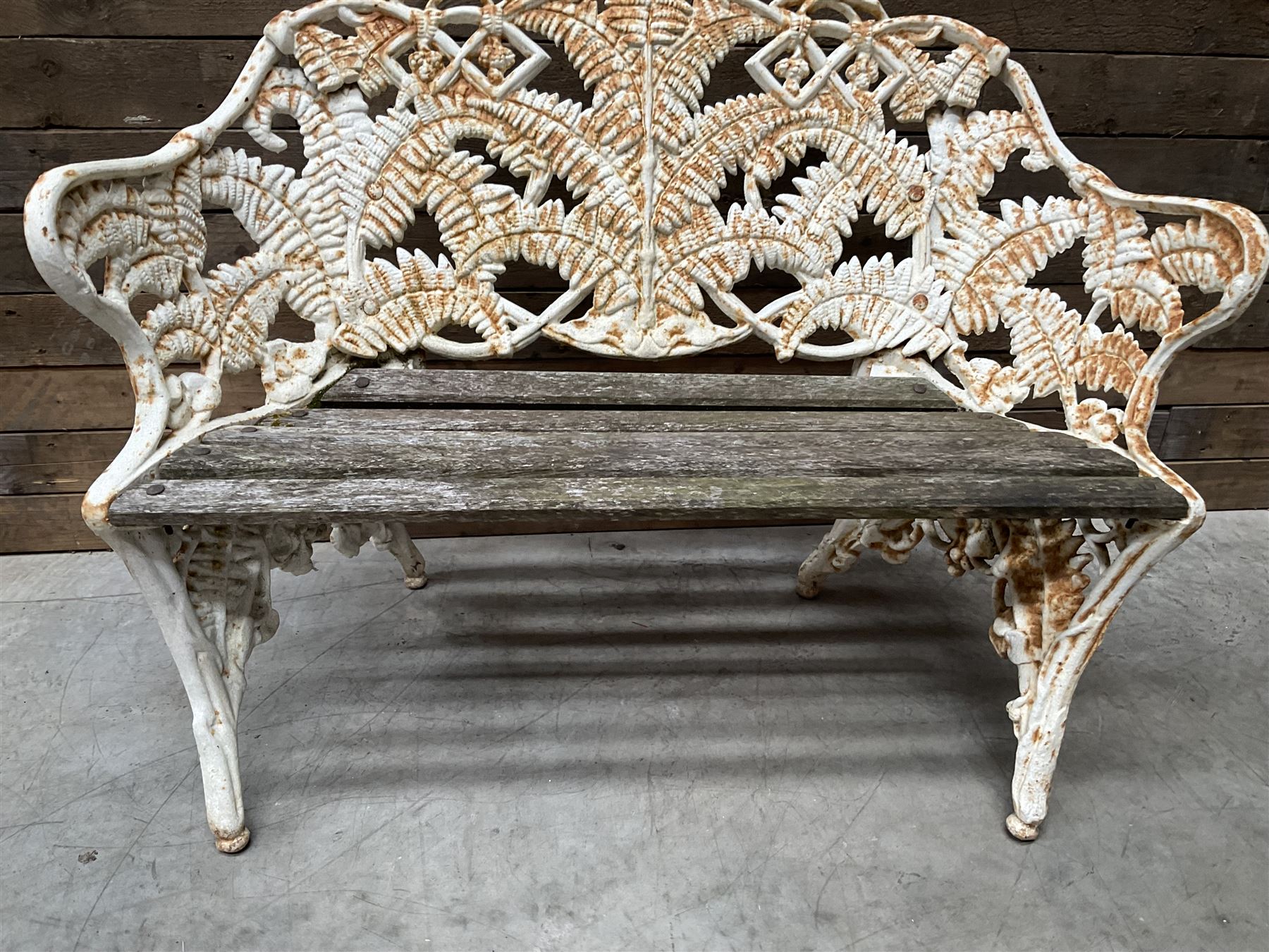 19th century cast iron Coalbrookdale design garden bench, elaborate fern leaf motif, slatted timber seat 