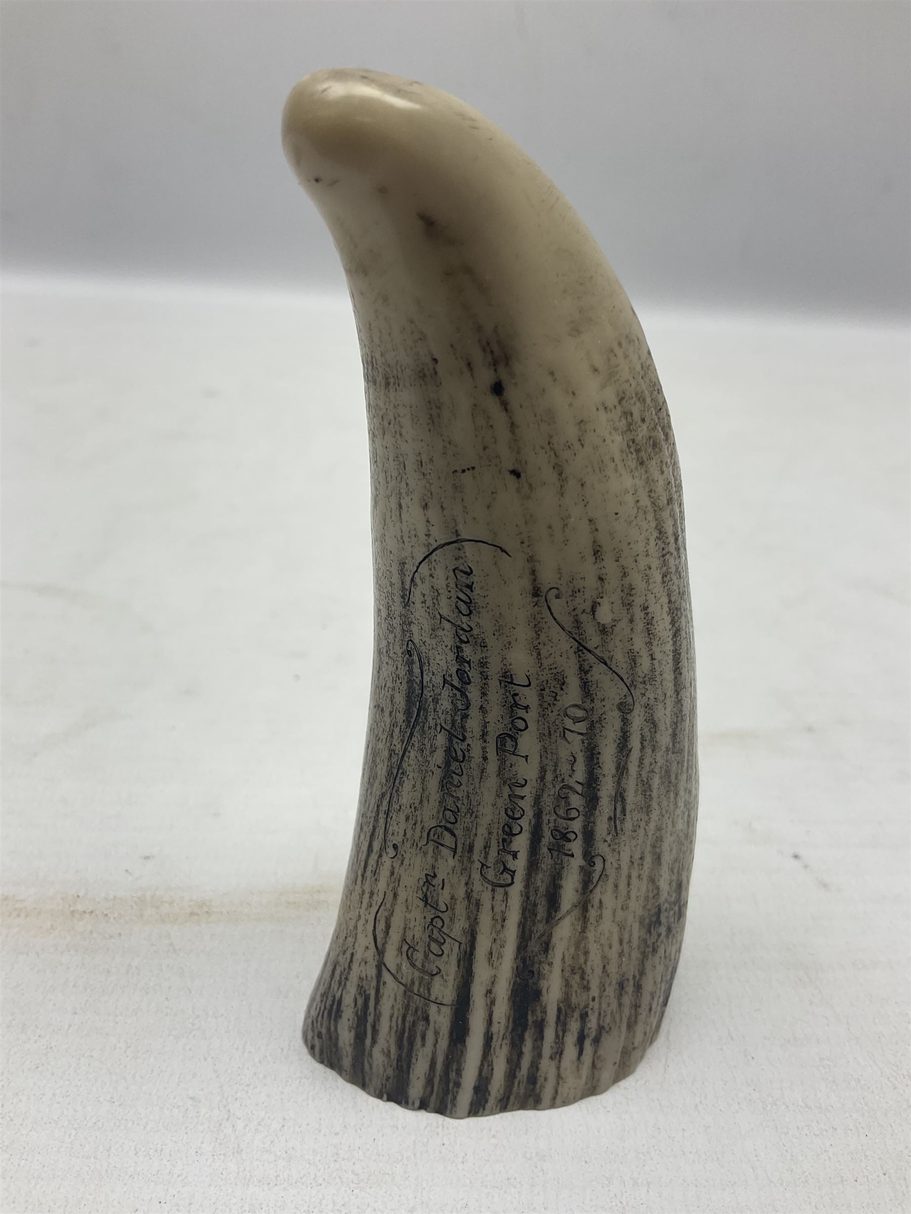 20th century resin carvings in the style of scrimshaws the first example depicting Ship Mercury, the other with a removable top, tallest example H10.5cm