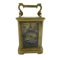 French - late 19th century 8-day carriage clock, in an Anglaise case with a rectangular glass panel to the top, enamel dial with Roman numerals, minute track and spade hands, rack striking movement, striking the hours and half hours on a coiled gong, with a lever platform escapement.  