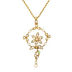 Early 20th century 15ct gold pearl, diamond and garnet pendant necklace, the flower wreath...