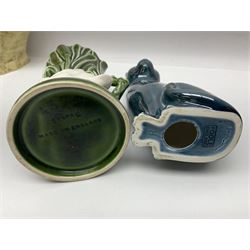 Sylvac budgieregar wall pocket, together with other Sylvac cermics including swan vases, blue tit vase and a frog figure etc, all with printed or impressed marks beneath, and a Poole Pottery cat figure, with printed mark beneath, wall pocket H22cm