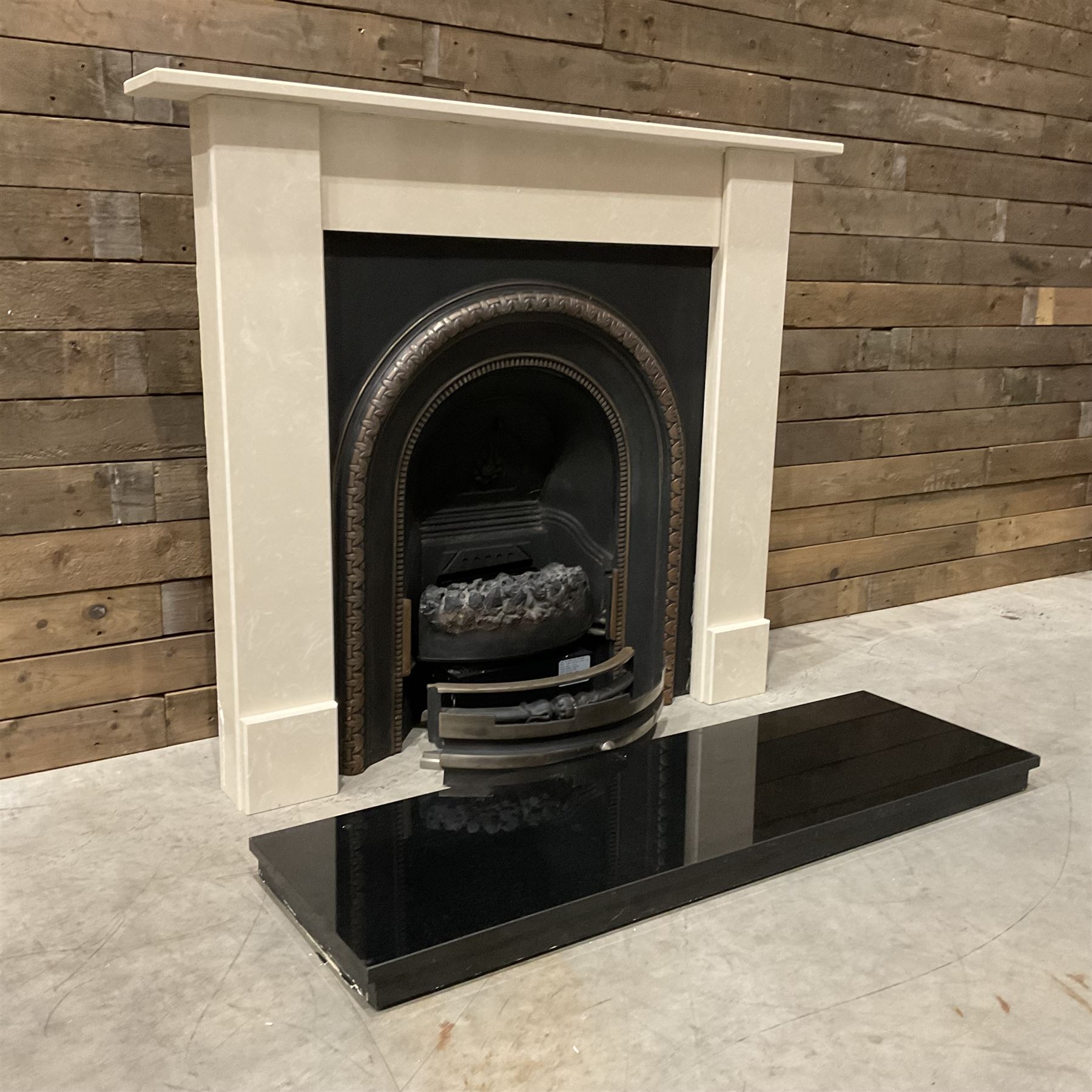 Aurora Dorchester Black Fire suite - granite style surround with cast iron insert, electric fire with remote and black hearth