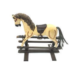  Dappled grey rocking horse with bridles, saddle and stirrups on trestle base (L118cm) and a small rocking horse (L72cm)  