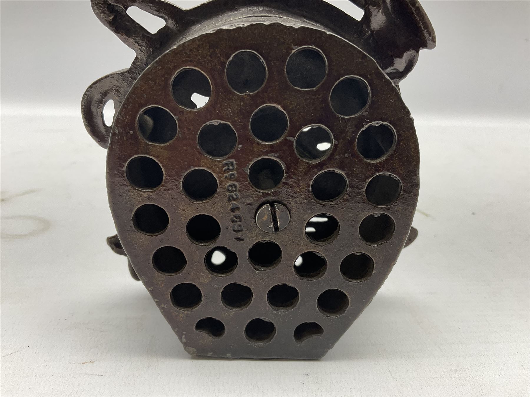 Four cast-iron money banks - 'Bear On Hind Legs bank' c1906 H16cm; 'ERII English Throne Bank' 1953 H21cm; both made by John Harper; 'Tally-Ho Bank' c1906 by Chamberlain & Hill H11.5cm; and 'Westminster Abbey Bank' c1908 by Sydenham & McCoustra H16cm (4)