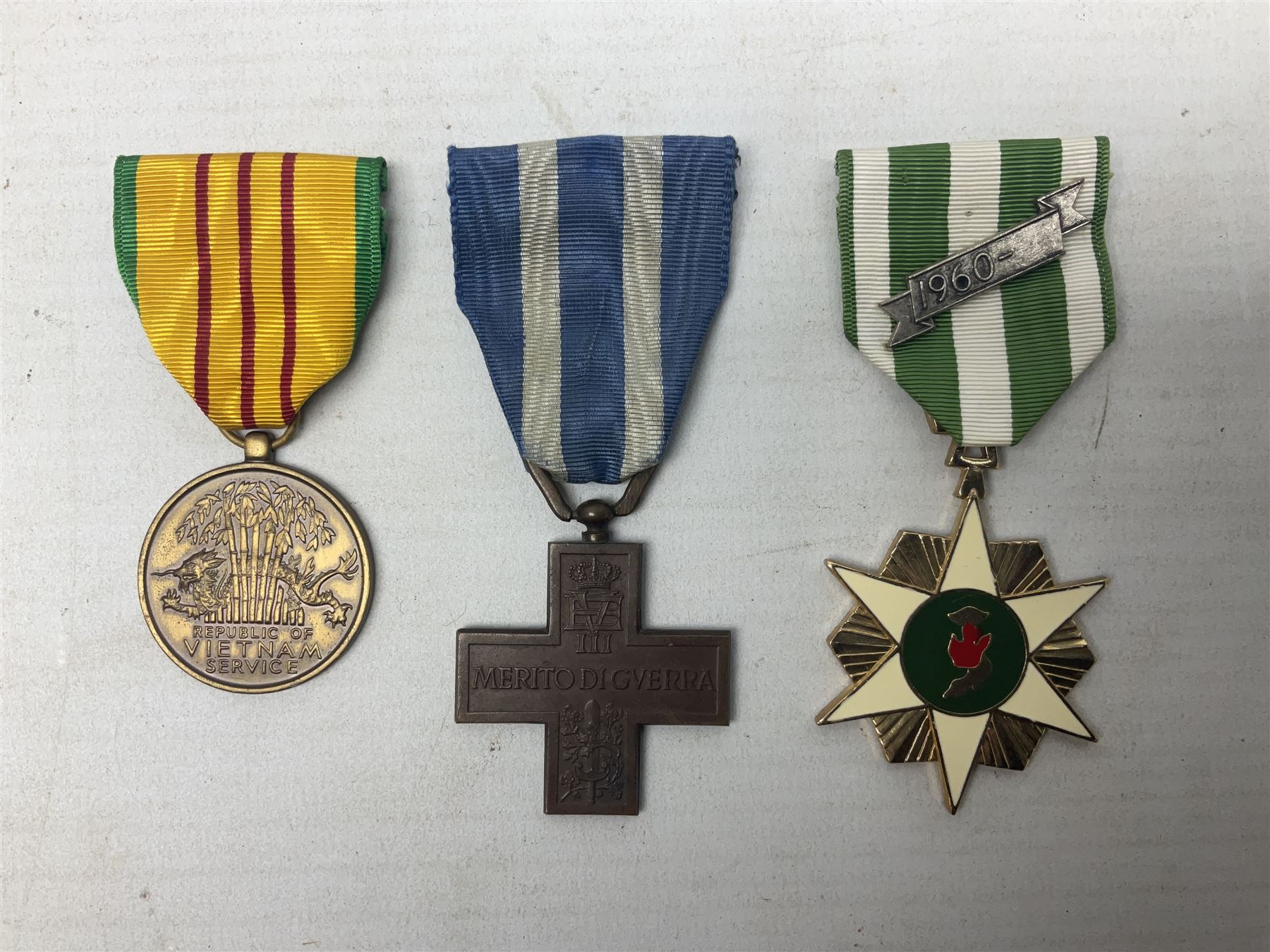 Seven worldwide medals - Austro-Hungarian Kaiser Franz Joseph Jubilee Medal 1848-98; Liberation of Kuwait; Italian War merit Cross 'Vitt Emm III Merito De Guerra'; silver shooting medal 1928-33; two Vietnam medals; and another; all with ribbons (7)
