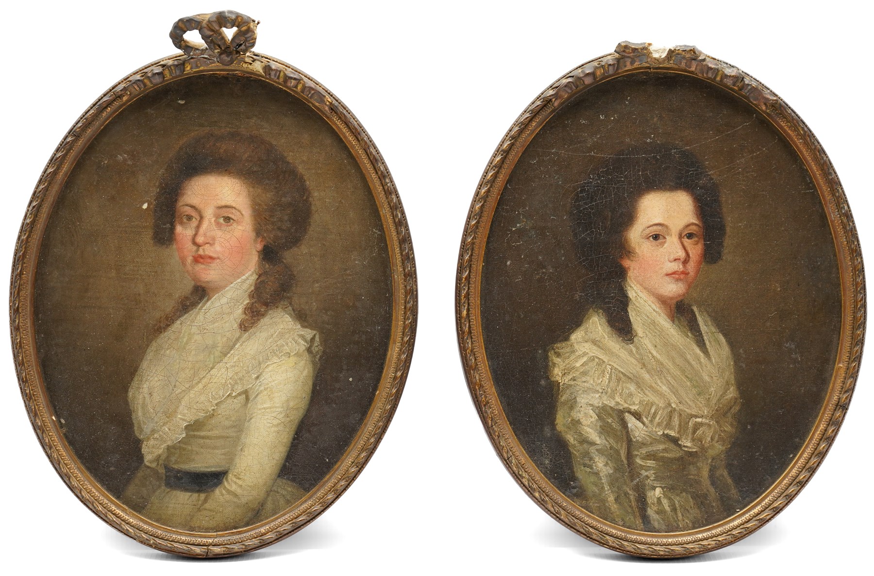 English School (late 18th/early 19th century): Two Portraits of Georgian Young Ladies, pair of oils on canvas laid on to board unsigned, in matching oval frames 24cm x 19cm (2)