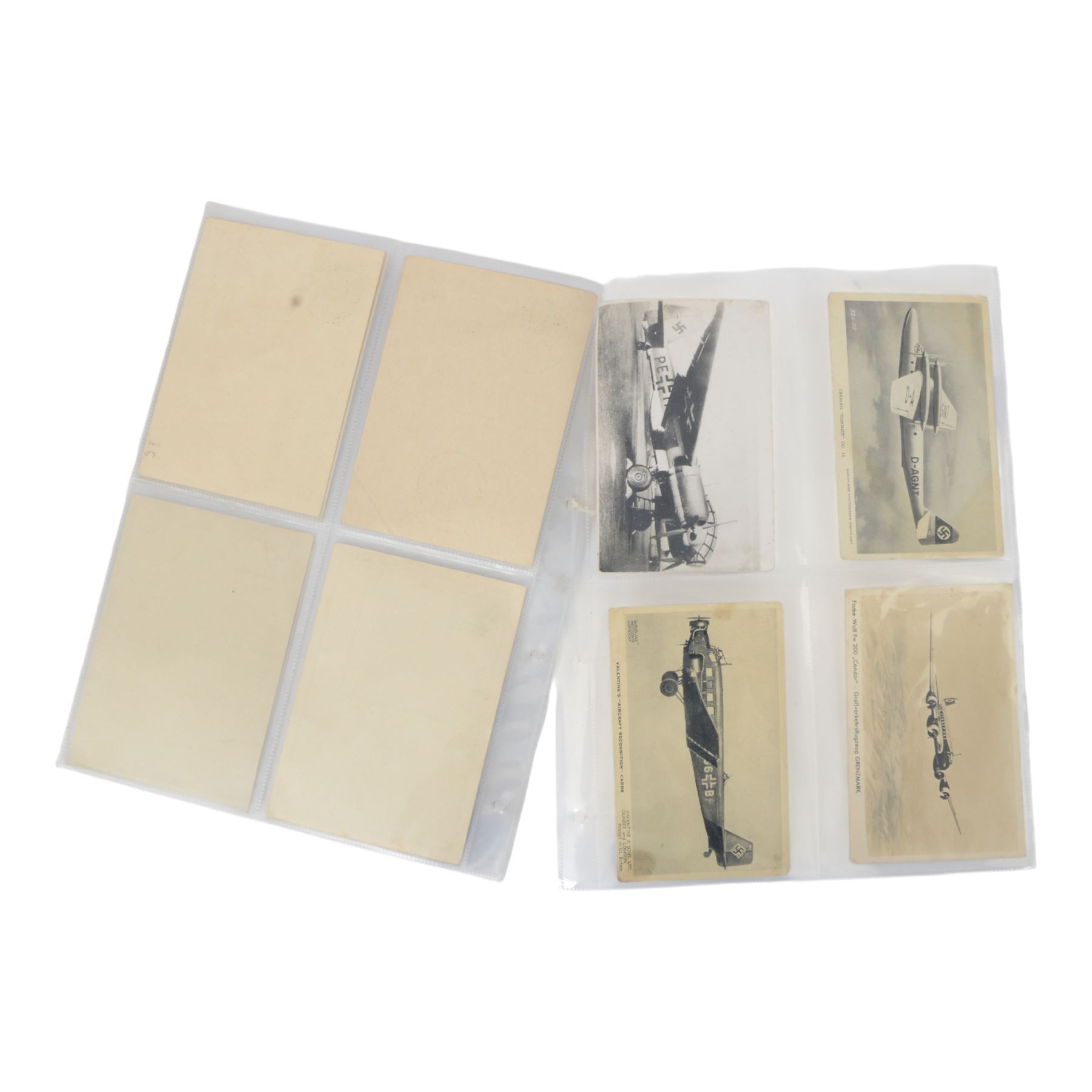 Fifteen German Third Reich and Dutch postcards, including Winter Help Work postcards, Dutch Anti Hitler cards and Third Reich Aeroplane cards
