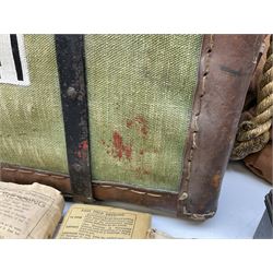 WW2 British Army RAMC 'Regimental Medical Pannier', well marked externally and dated 1941, stamped May 1943 internally, canvas covered wicker form with leather edges, hinged top and fall front with two rope carrying handles, fitted iron locking straps with securing chains; contains various unused field dressings and bandages with WW2 dates and two pillows; original label under lid L79cm