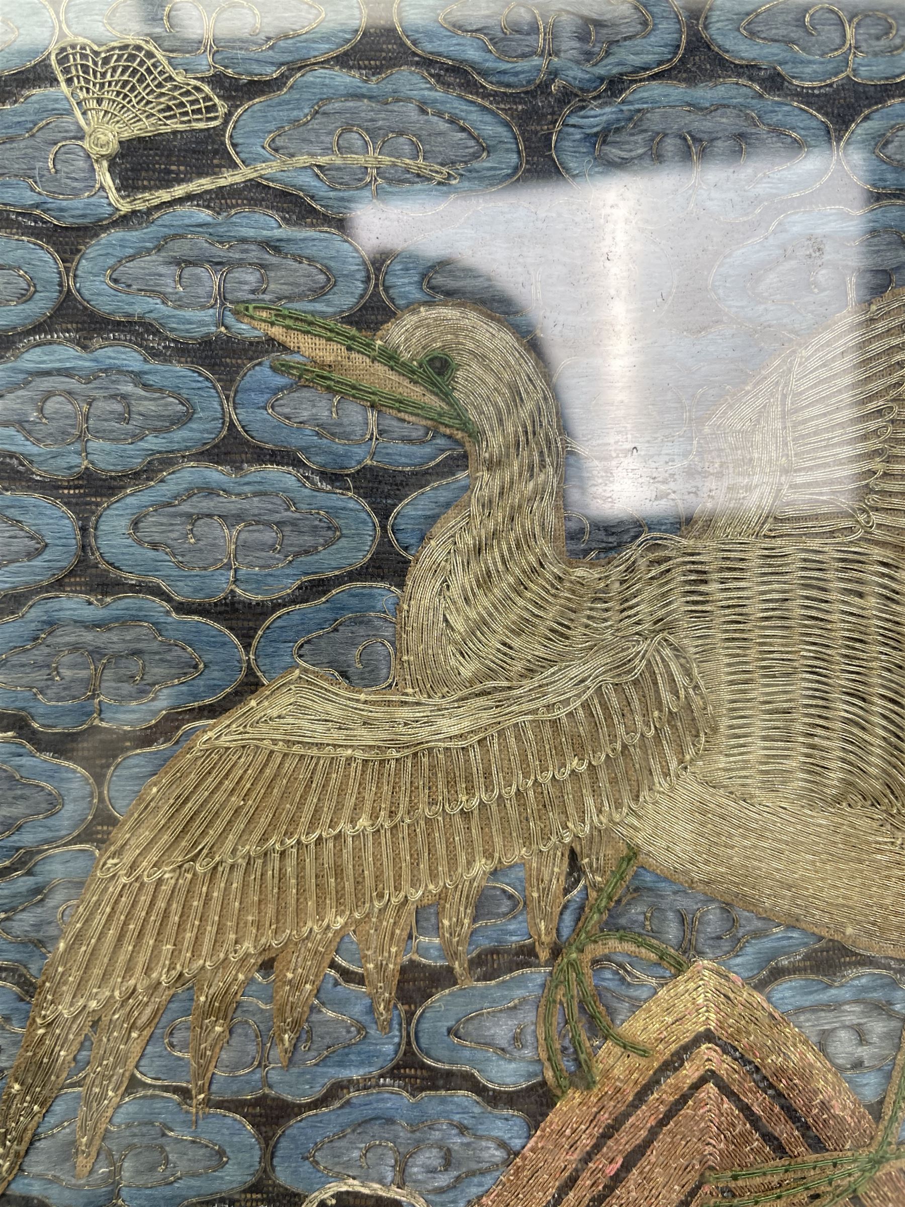 Early 20th century Chinese silk work tapestry, depicting a crane flying over a river, H30cm 