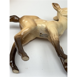 A Beswick family group, comprising stag, doe, and fawn, each with printed mark beneath, largest H20.5cm.