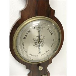 Early 19th century rosewood four dial banjo barometer, dry/damp dial, mercury thermometer, silvered circular register engraved with urn and scroll decoration, balance signed 'Vassalli Scarborough', fitted with mother of pearl adjusting handle