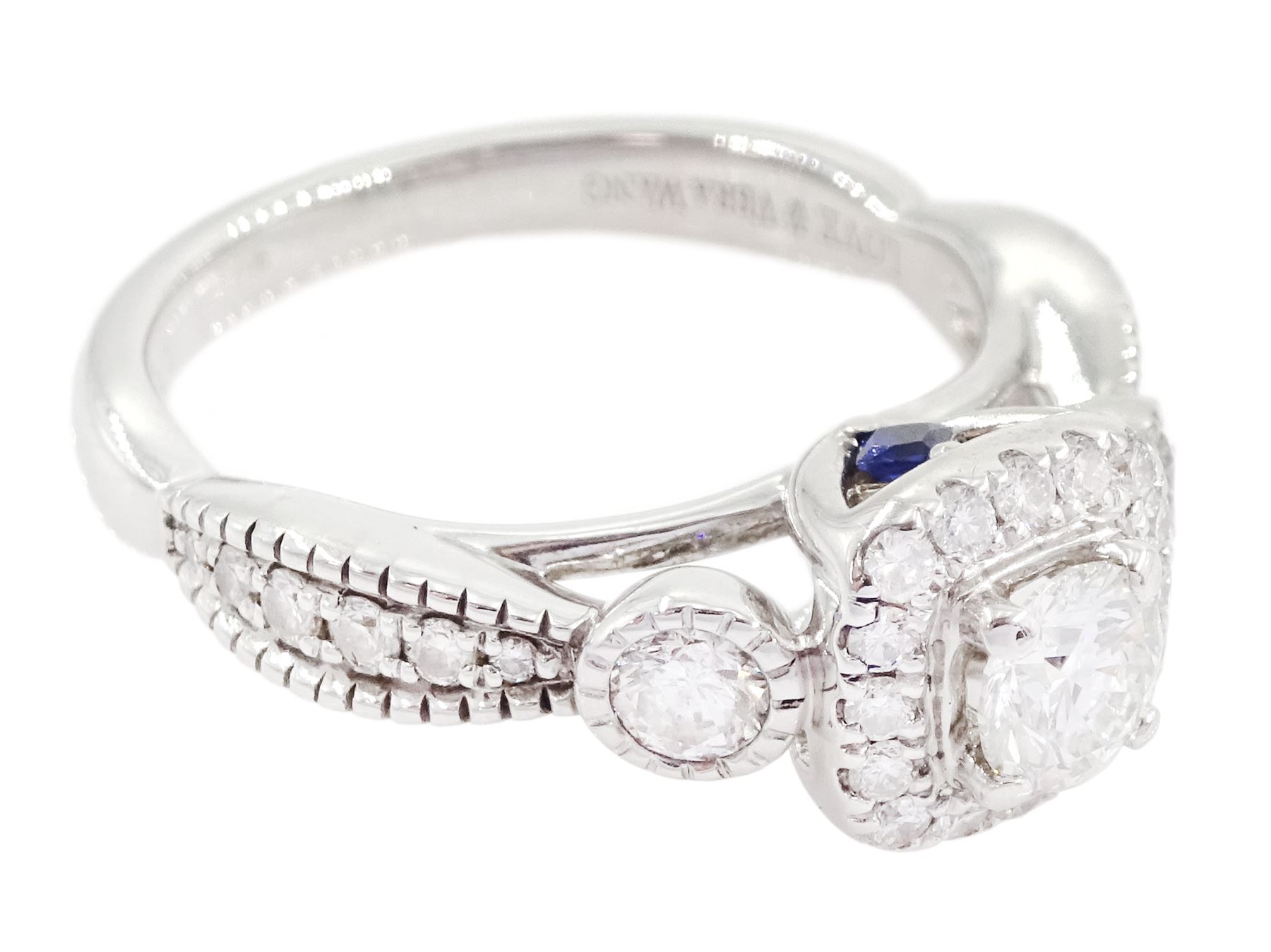Vera Wang 18ct white gold diamond and sapphire 'Love' ring, round brilliant cut diamond cluster, with diamond set shoulders and sapphire set gallery, total diamond weight 0.70 carat, boxed