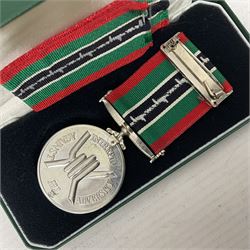 Two Imperial Service Medals to Elsie Hannah Ferguson and Fred Whitehead; each in original case; WWI Special Constabulary Medal to Inspr. Alfred W. Thompson; modern Prisoner of War Medal; cased; replica Victoria Cross and India Mutiny Medals with archive of information relating to Pte. Robert Newell V.C. 9th Lancers; replica Victoria Cross and George Cross with miniatures; and other replica medals etc