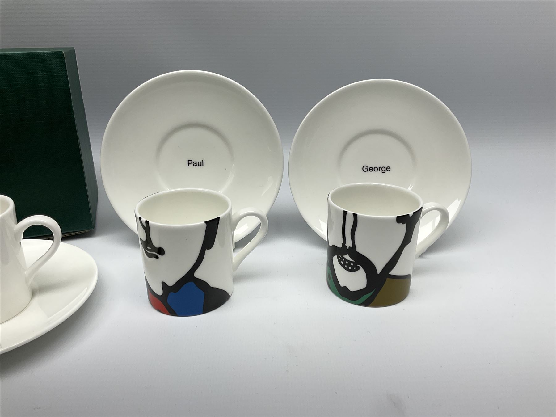 Four limited edition Beatles Yellow Submarine espresso cups and saucers, designed by Paul Smith and made for Thomas Goode, 78/200, in original box