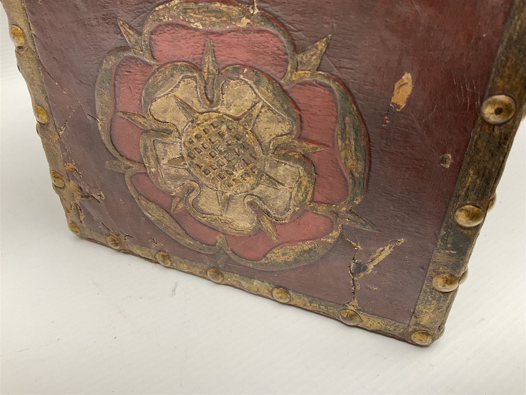 20th century box, decorated in faux leather with the royal coat of arms and GR 1719 to hinged cover, with fleur-de-lis, lion, crown and rose motifs throughout and studs to all edges, opening to reveal a purple velvet interior containing three removable wooden trays, H18.5cm