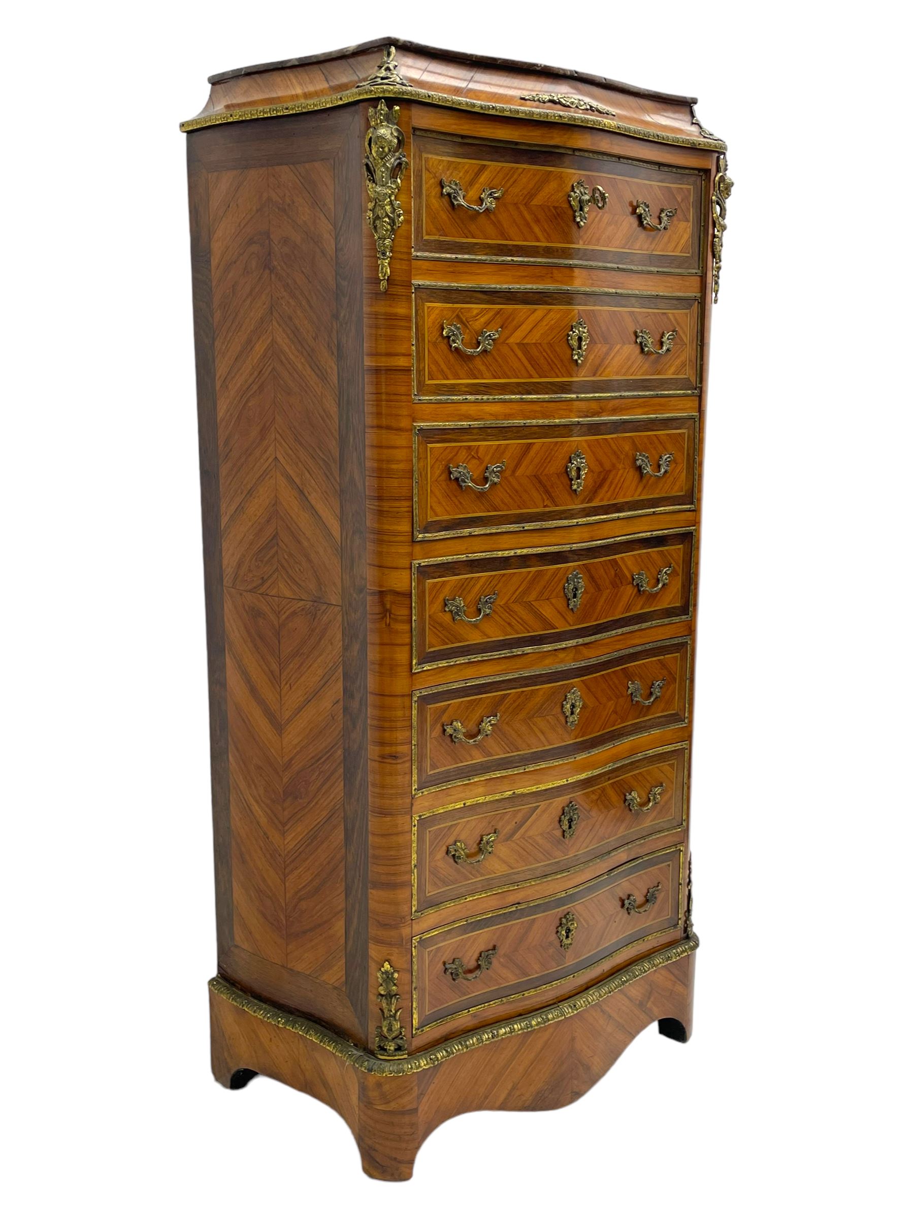 Mid-20th century Louis XVI design Kingwood and walnut secretaire à Abattant, shaped serpentine form with dark rouge variegated marble top, the fall front disguised as three drawers enclosing birdseye maple interior with shelf, drawers and writing surface, four functioning drawers below, decorated with cast gilt metal mouldings and mask cartouches, on skirted base with egg and dart moulded gilt metal edge