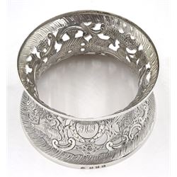 Edwardian Irish silver dish ring, of circular waisted form, embossed and pierced throughout with scene of figures, birds, cattle and buildings amidst C scrolls, hallmarked James Wakely & Frank Clarke Wheeler, Dublin 1906, upper rim D10cm, approximate weight 4.11 ozt (128 grams)