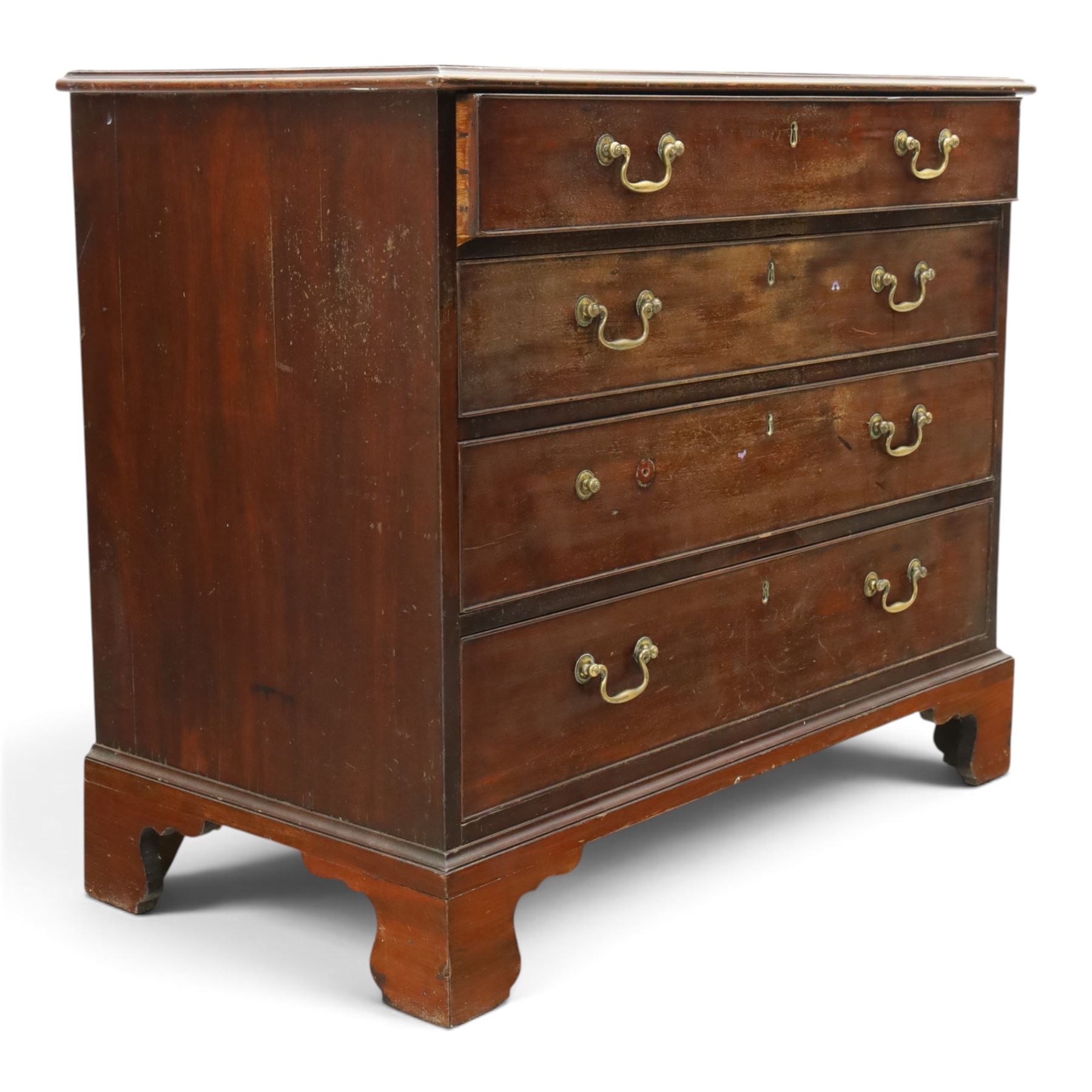 George III straight front mahogany chest, fitted with four graduating drawers with cockbeaded edges, raised on bracket feet