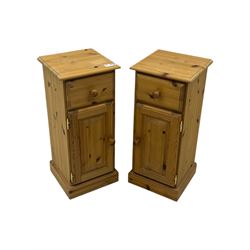 Pair of solid pine traditional design bedside cabinets, one draw above a cupboard with inner shelf