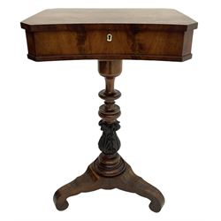 Victorian mahogany work or sewing table, canted rectangular form with reverse bow front, the figured hinged lid enclosing well fitted interior with turned bone handles, with mother of pearl escutcheon, on turned and acanthus baluster carved column, the triangular platform base terminating at scrolled splayed feet