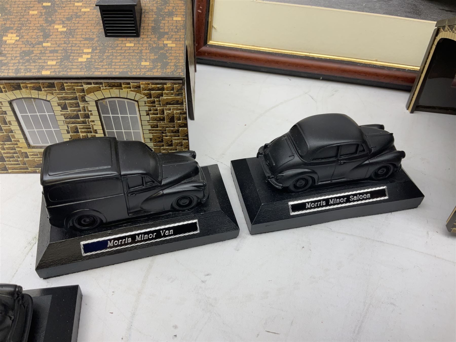 Quantity of model houses, framed print, coal E & J Mining Memories Morris Minor figures etc