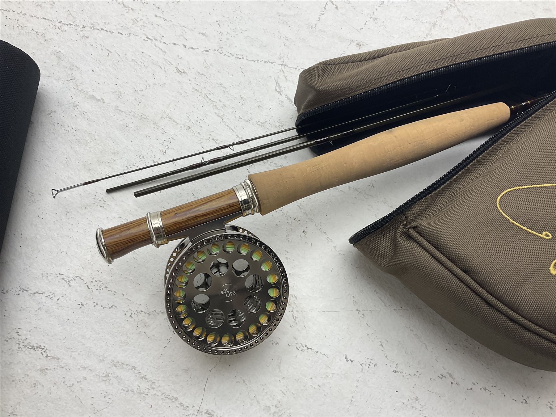 Five fly fishing rods, to include Greys Greyflex M2, Greys Missionary 9'3 etc, together with fly reel, flies, Wychwood fishing bag and various fishing other tackle items 