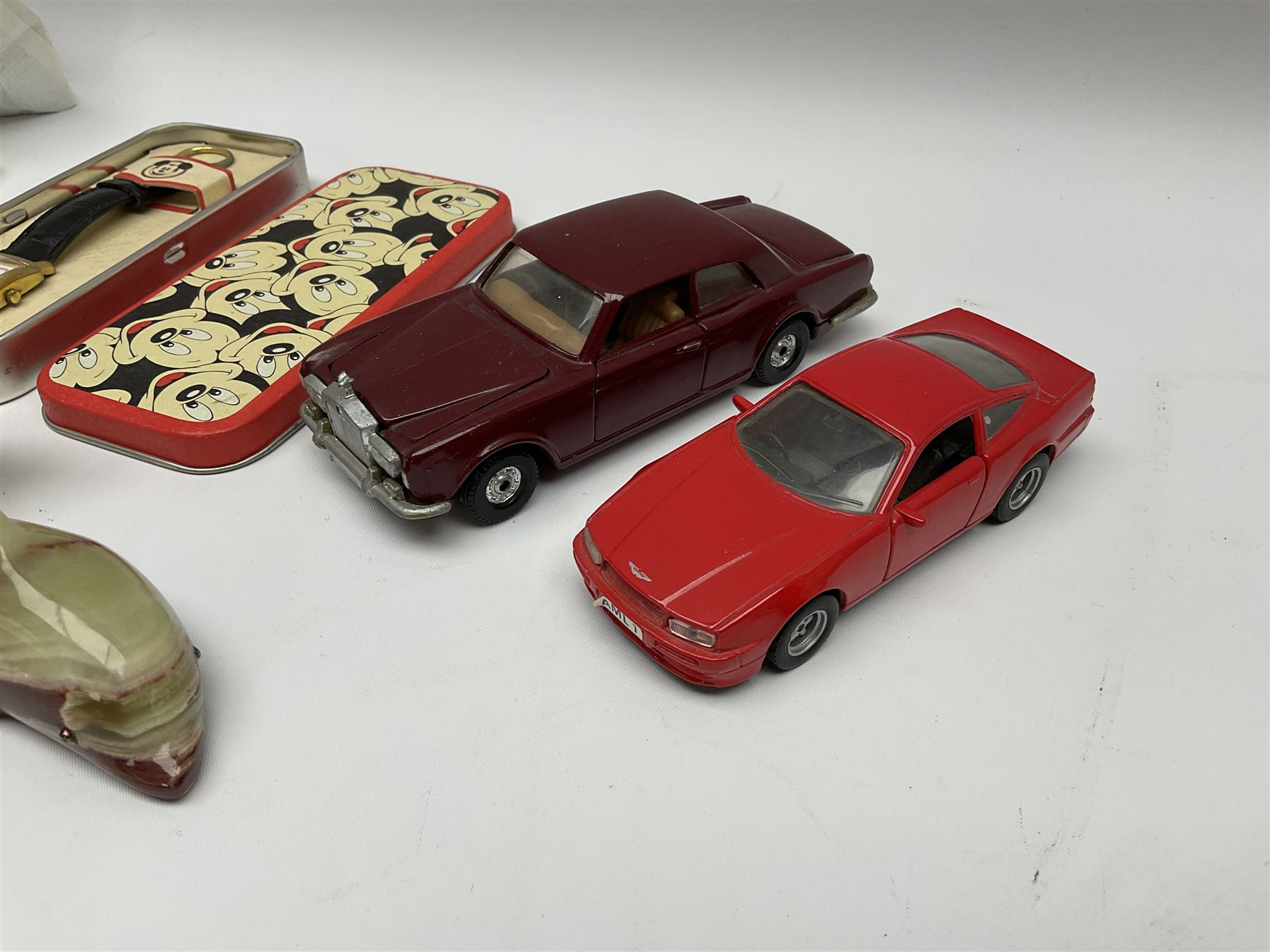 Onyx chess set, W21cm, Mickey Mouse watch in tin, Corgi Rolls Royce Corniche model, Aston Martin model and an onyx dolphin figure 