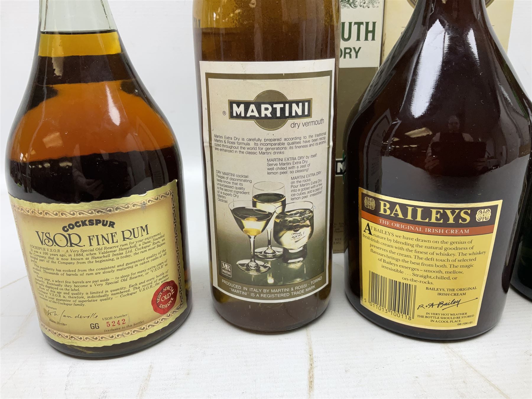 Mixed alcohol comprising Harveys Medium Dry Sherry, 70cl, one bottle, Croft Original Fine Old Pale Cream Sherry, 70cl, one bottle in box, Martini Extra Dry Vermouth, 90cl 18% vol, one bottle in box, Cockspur Barbados V.S.O.R Fine Rum, one bottle, and Baileys Irish Cream, 1l, one bottle (5)