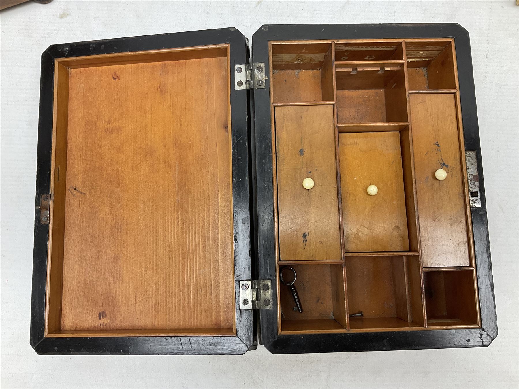 Walnut tea caddy of sarcophagus form, two division lidded interior with a later glass mixing bowl, upon four brass bun feet together with a walnut sewing box with mother of pearl inlaid decoration, tea caddy H16cm