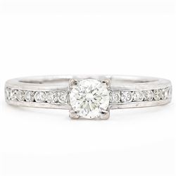 18ct white gold diamond ring, four claw set with a single round brilliant cut diamond of a...