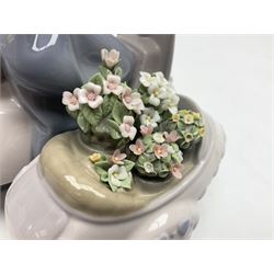 Lladro figure, Floral Getaway, modelled as a girl on a scooter with a sidecar of flowers, sculpted by Joan Coderch, no 5795, year issued 1991, year retired 1993 