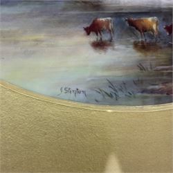 Pair of turn of the century Royal Worcester oval porcelain plaques painted by John Stinton, the first example depicting highland cattle watering against misty mountains, titled 'Loch Lomond' verso, the second depicting cows watering before a bridge with church in the distance, titled 'Bakewell Bridge Derbyshire', each signed J Stinton, each with puce printed mark verso, and date codes for 1899 and 1900, each contained within gilt frame with mount, plaques approximately 14.5cm x 23cm, overall 29.5cm x 38cm